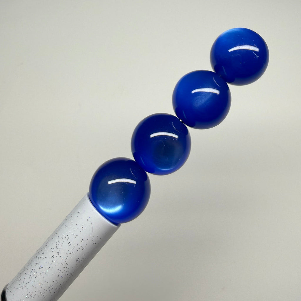 Royal blue cat’s eye bead